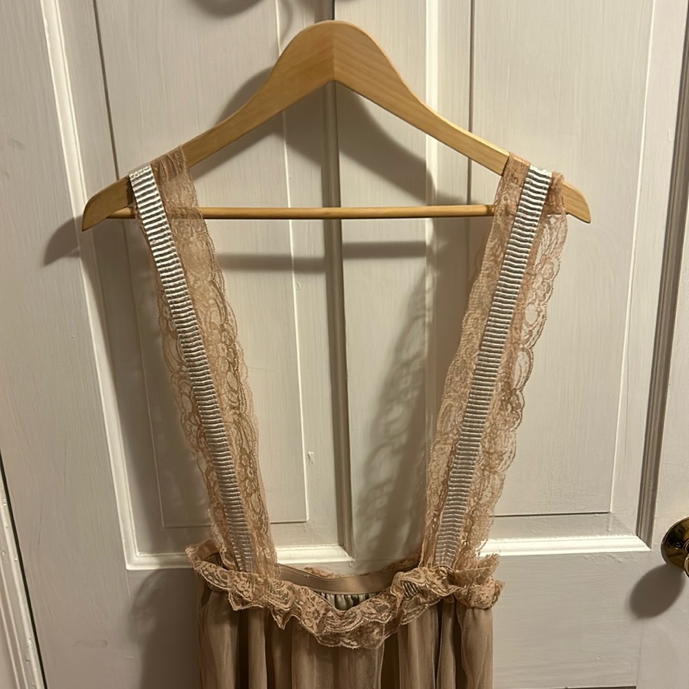 Layered sheer skirt with lacy suspenders and elastic waist